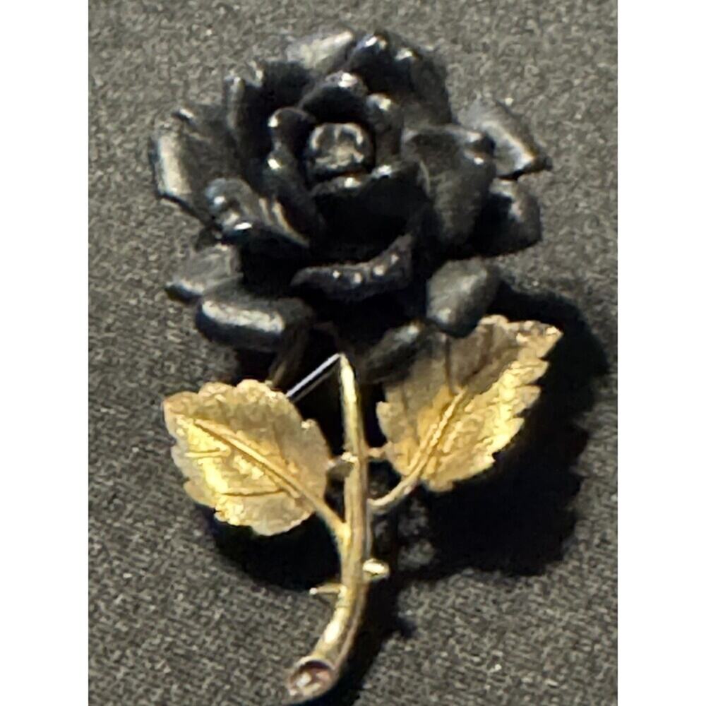 Signed Trifari Black Rose Gold Tone Brooch